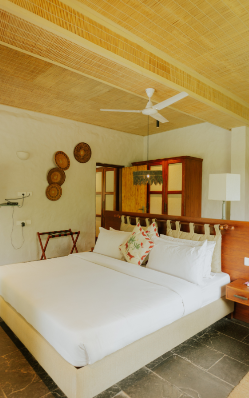 FHR Wilderness Lodge — king bedroom with bamboo ceiling and ceiling fan